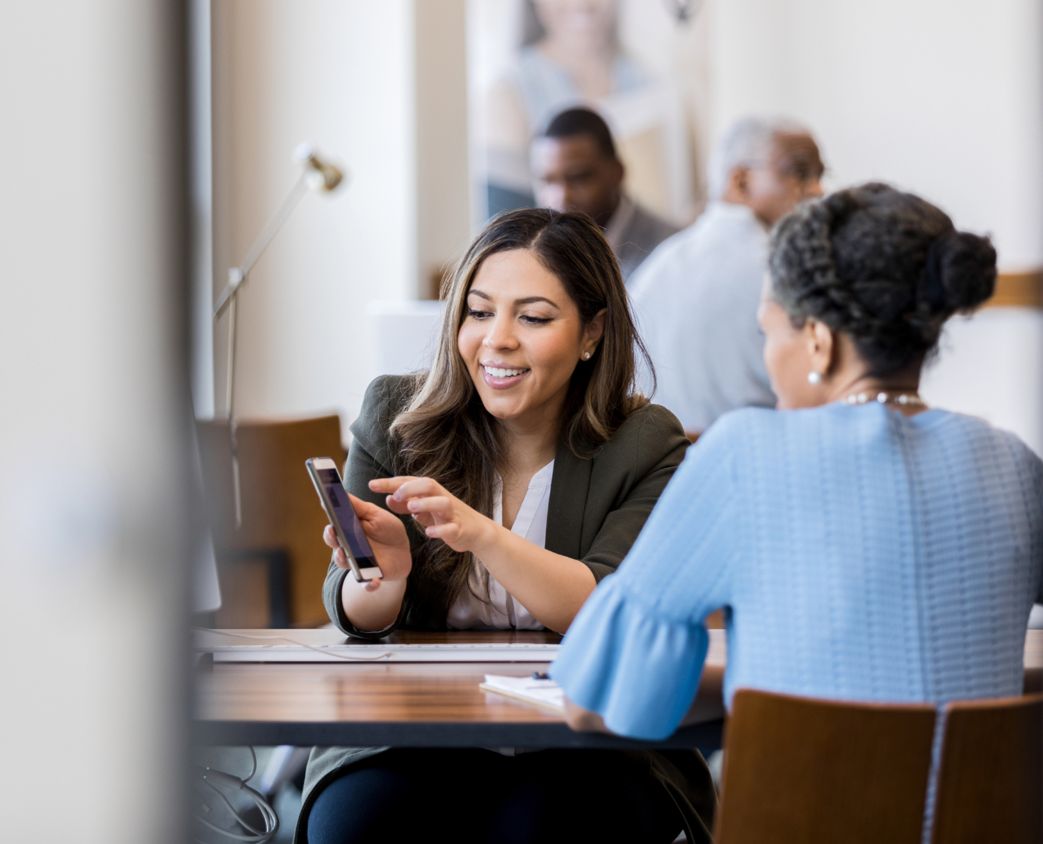 Professional woman in a bank setting symbolizing digital transformation in bank marketing