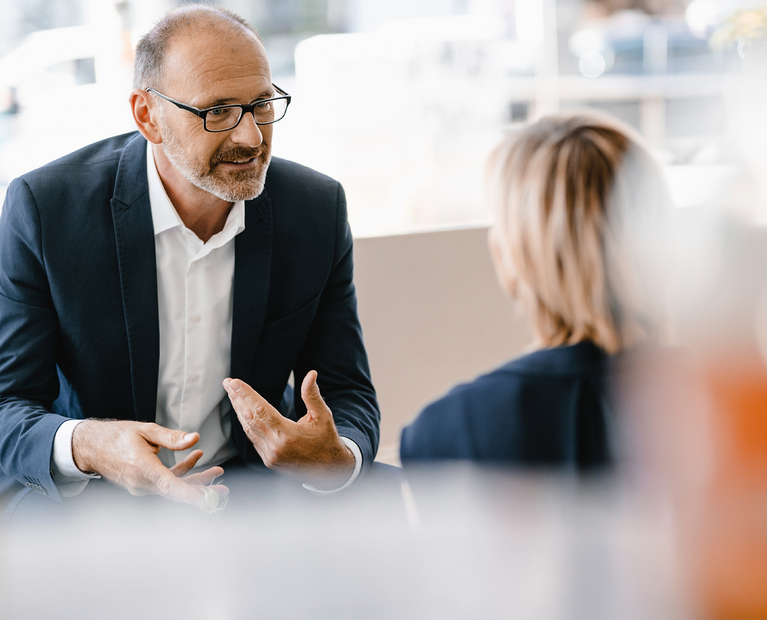 Bankers discussing targeted marketing campaigns